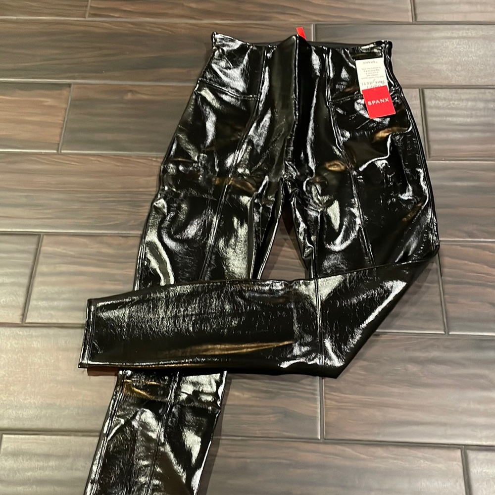 Spanx size medium faux patent leather leggings new with tags.